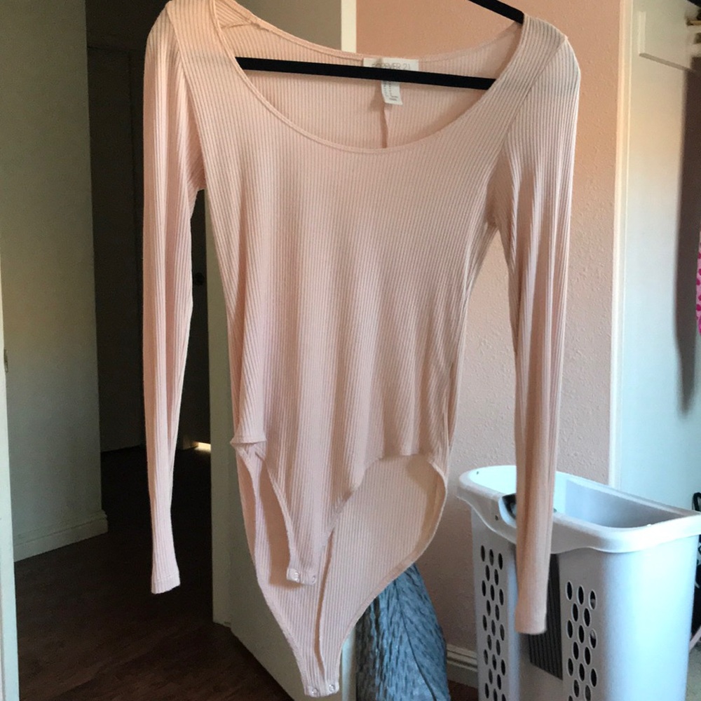 Light pink body suit